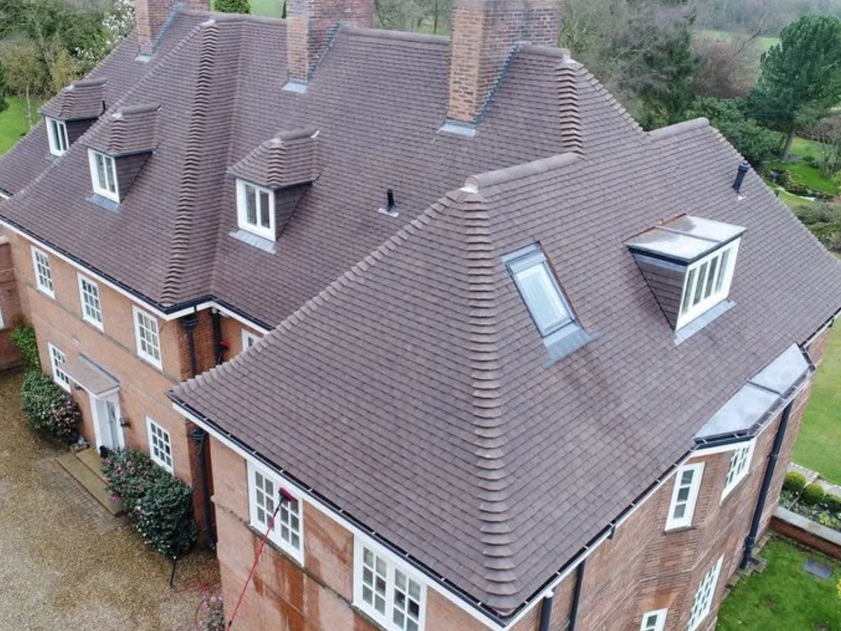 Aerial view of a large tiled roof completed by Tammat Group