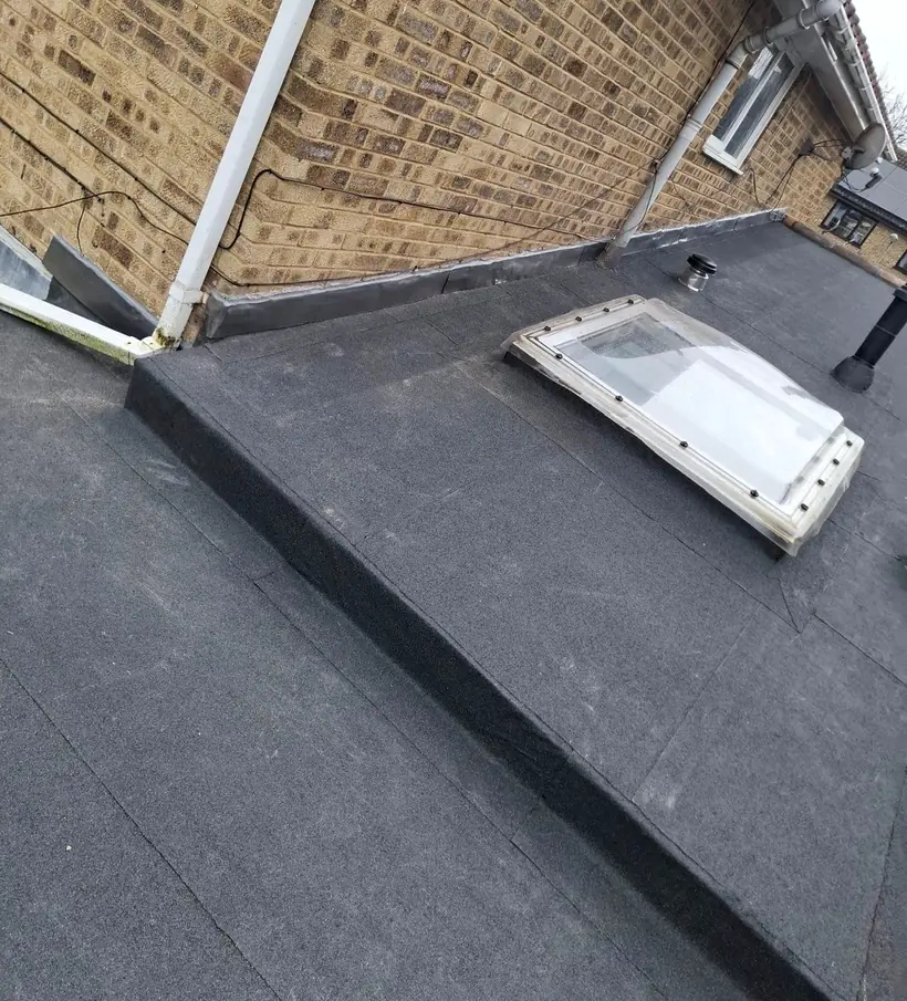 A new flat felt roof with rooflight completed by Tammat Group