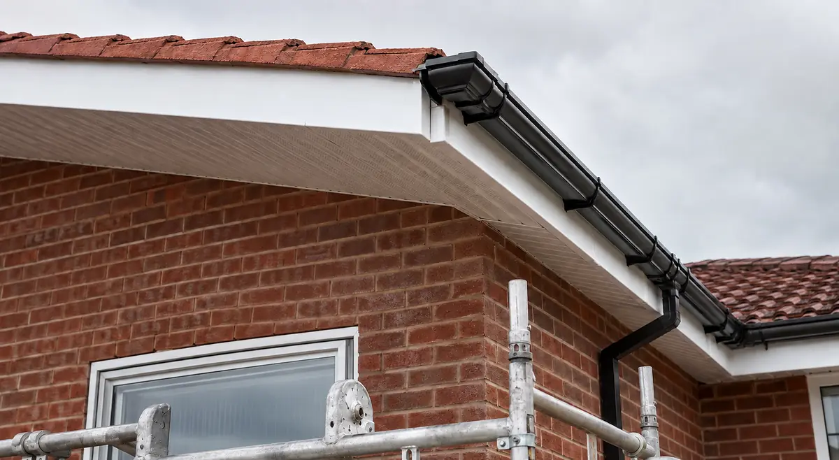 Fascia boards and guttering along a roofline by Tammat Group