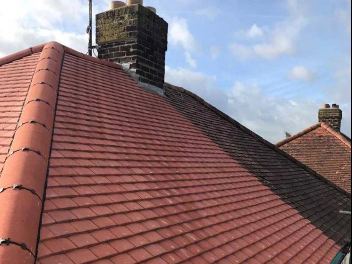 A distinct red clay tiled pitched roof completed by Tammat Group